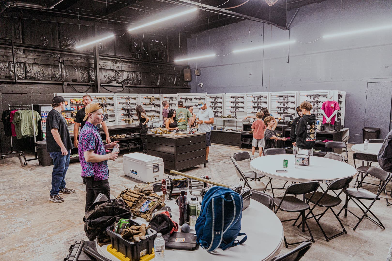 The Warfare Airsoft lobby with the rental wall, counter and seating